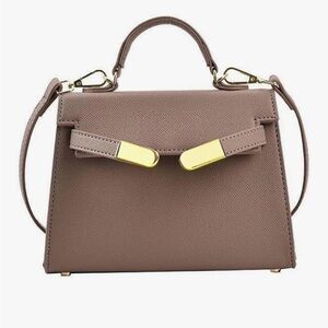 Top handle mini bag in khaki brown with gold hardware and crossbody strap